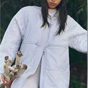 FP Movement by Free People Light as a Feather Packable in Ice Gray.